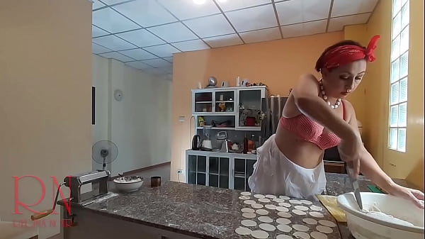 Nudist housekeeper Regina Noir cooking at the kitchen. Naked maid makes dumplings. BRA