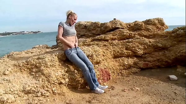 Young blonde slut gets fucked in the ass on the beach