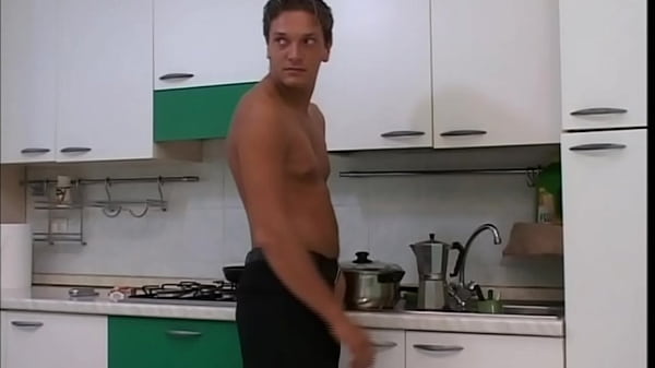 On the kitchen couch, the tranny gets fucked doggy style.