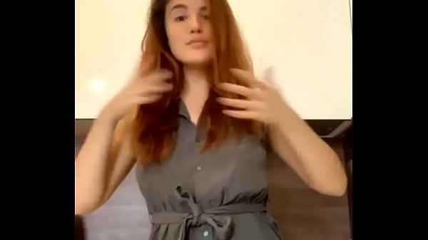 Download Video - Young Russian redheaded bitch moves sexually in front of the camera