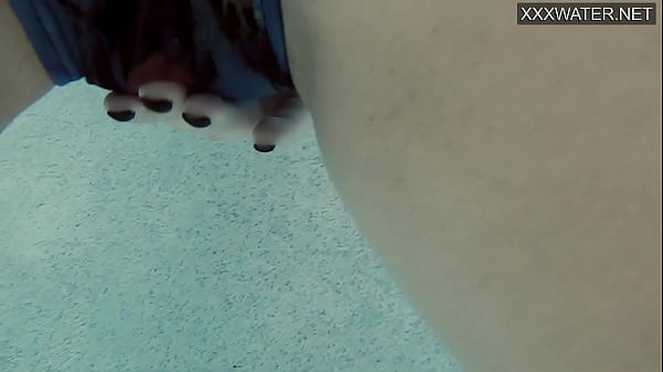 Young babe Emie Amfibia gets orgasms in the swimming pool