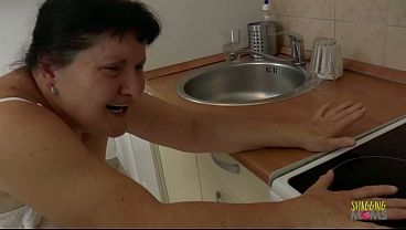 The bbw milf in the kitchen was very eager to be ass licking his booty