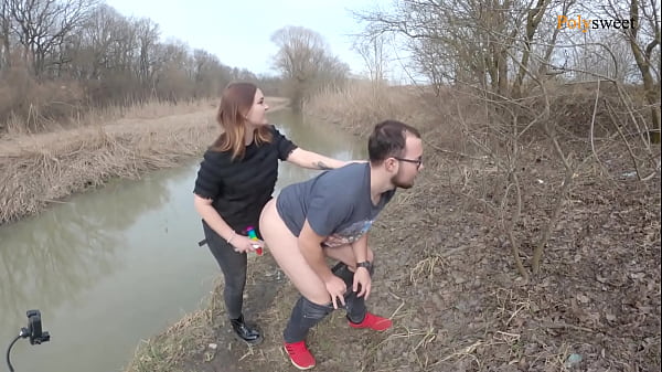Hiding from cars while fucking with a strapon