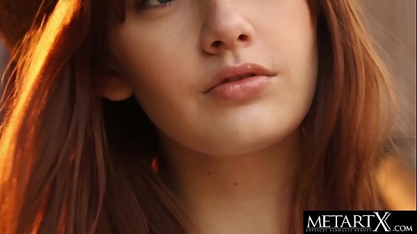All-American beauty in a stetson hat strokes her perfect pussy