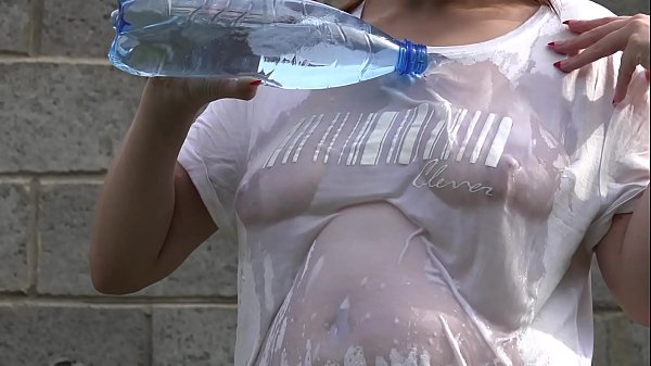 Big tits under a wet tank top and masturbation of a hairy pussy with a bottle. Amateur fetish and sexy butt Doggystyle outdoor.