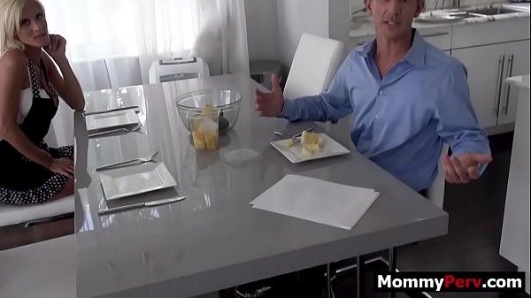 Stepmom gives stepson blowjob next to his busy step dad