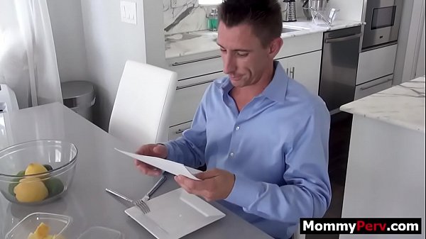 Stepmom gives stepson blowjob next to his busy step dad