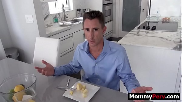 Stepmom gives stepson blowjob next to his busy step dad
