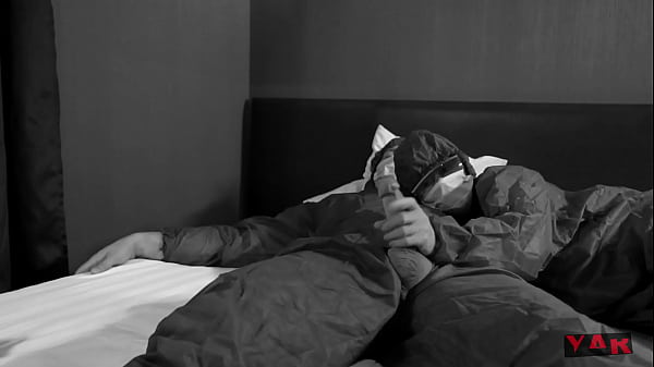 an infectious disease doctor in a protective suit jerks off a big cock to a colleague