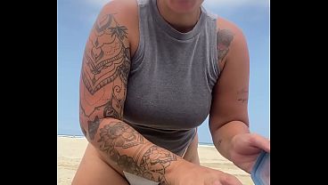 Blogger who records videos on the beach grabbing married men's penises.
