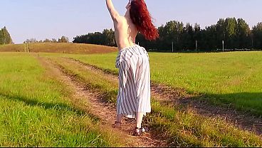 Red-haired beauty in the field