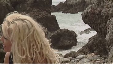 Blonde babe gets nipple and clit licked and pussy fucked hard by huge dick by the beach