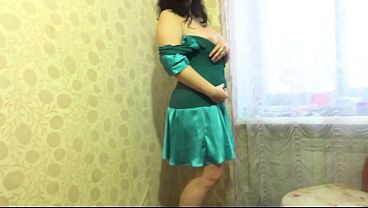 A busty MILF pees all over her dress and panties. Amateur dirty fetish with urine.