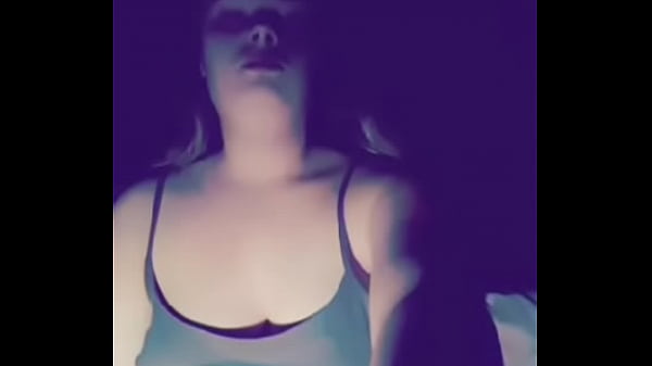 Busty slut plays with tits