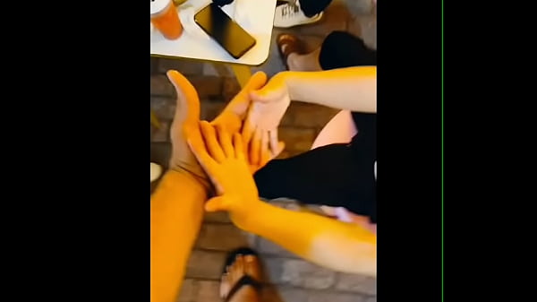 Giant man compares huge hand to small man