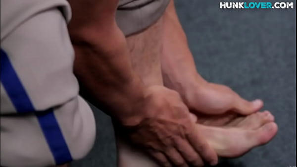 Solo stud teases body while stroking dick in lo...