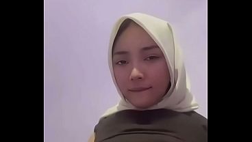 Malay hijabi slut with massive tits fingering her wet cunt till she squirts