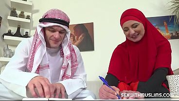 Black stockings and lace are hidden under the hijab