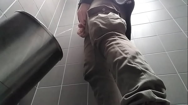 Download Video - Young man with uncut dick peeing in a public urinal&period; He then shows and shakes his dick&period;