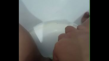 Playing around in the bathroom with my pussy since my husband couldn't satisfy me.