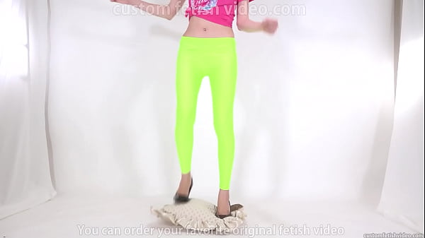 Beautiful legged woman stepping on cushion with high heels