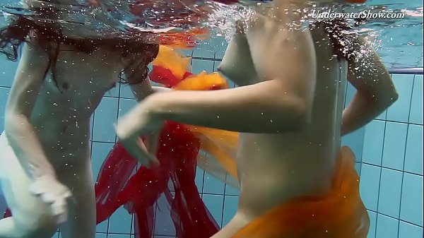 Two redheads swimming SUPER HOT!!!