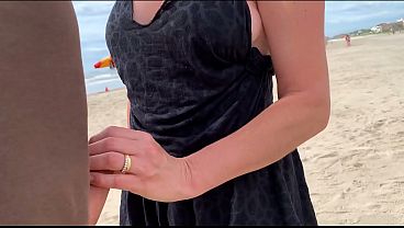 Download Video - A milf jerk off a stranger on a public beach for a bet&excl;