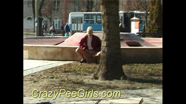 Crazy pee girl pissing outdoor