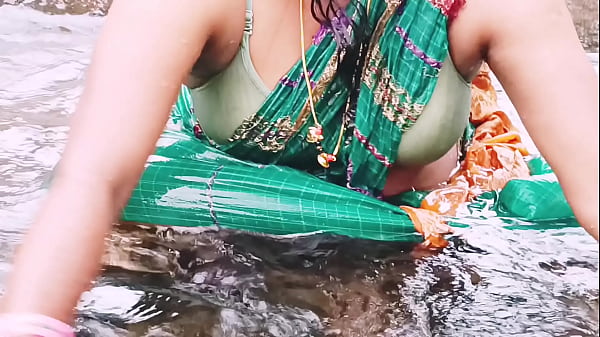 Villege aunty outdoor water fall bathing. Telugu dirty talks.