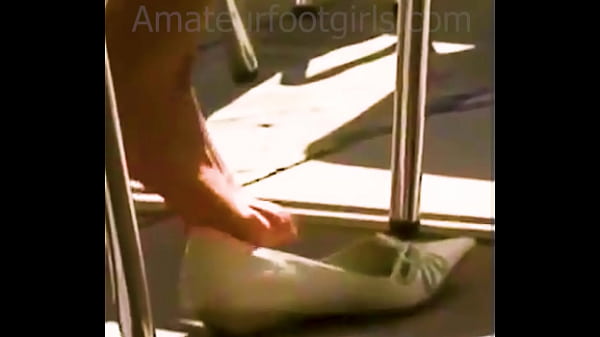 Candid Feet, girl relaxes barefoot and plays with her sweaty toes, looks at her sweaty stinky flats.