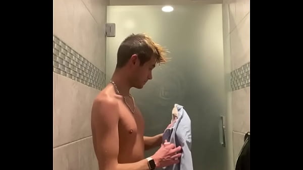 KEVIN ENJOYS A SHOWER POST WORK OUT
