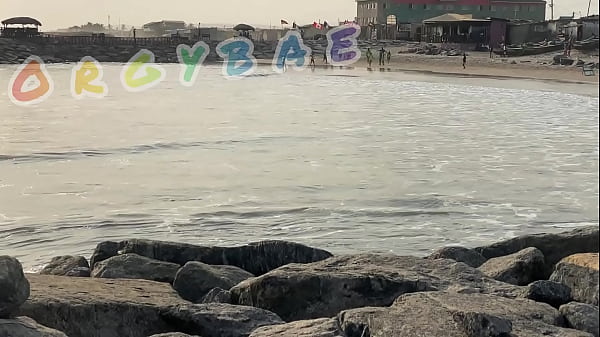 Couple play voyeur at public bar and beach