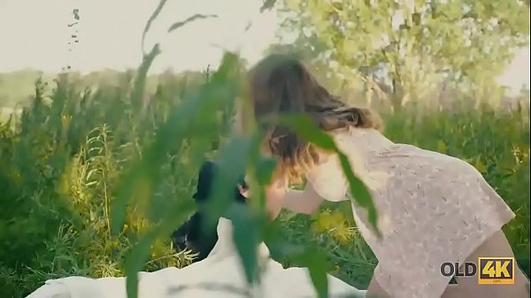 OLD4K. Gal with glasses drilled by friends old in the fresh air