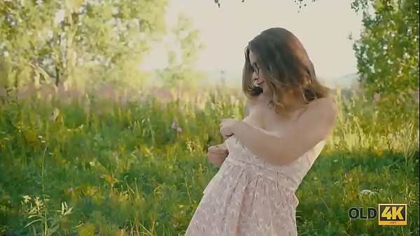 OLD4K. Gal with glasses drilled by friends old in the fresh air