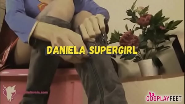 Supergirl takes off her boots and lets you play with her toes in pantyhose