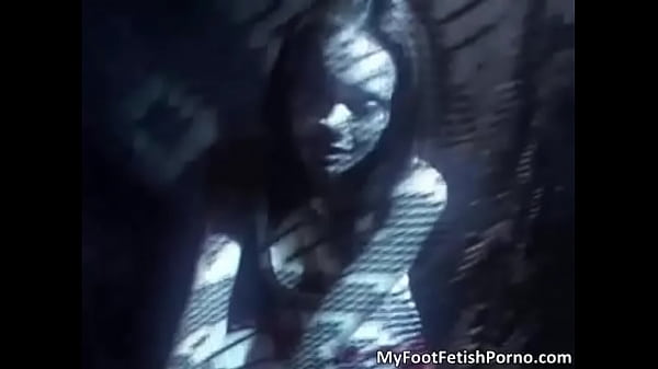 Nasty redhead babe gives awesome footjob