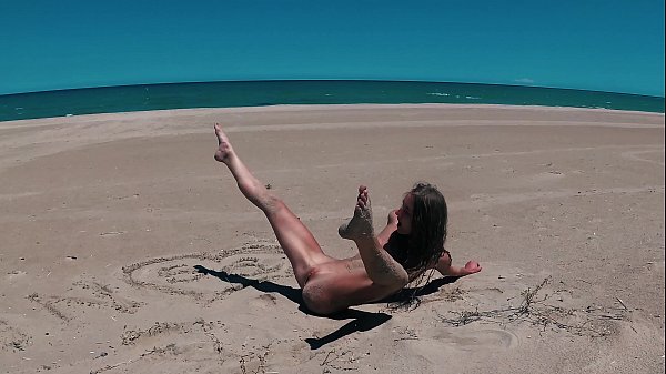 Download Video - Russian girl Sasha Bikeyeva  - Beautiful naked young girl with perfect figure dances on the Playa del Pouet in Valencia