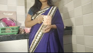 Desi Bhabhi was drinking tea in the kitchen when her neighbor came and fucked her.