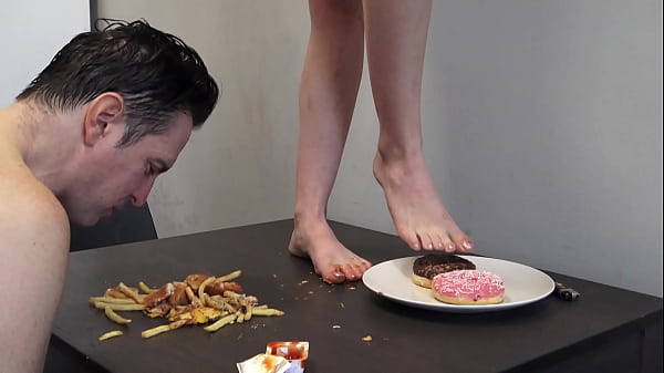 Princess Kirstin humiliate her slave with feeding of burger, pommes and donats from her feet.