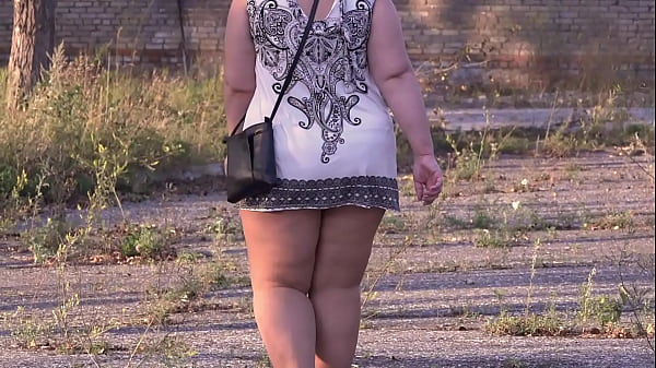 Walking ass under a short dress. Curvy MILF with big butt in nylon pantyhose masturbates outdoors. Amateur fetish. PAWG. BBW. Public.
