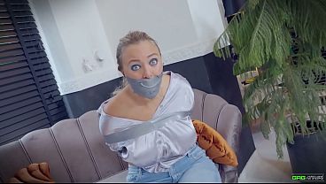 Beth - Secretary wearing satin blouse and Jeans tied up and tape gagged in tape bondage