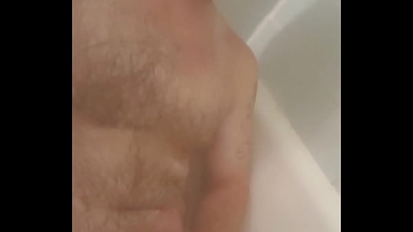 Young guy jacks off in shower