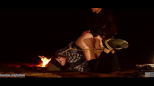 Genuine anal virgin is tied up in desert at night for anal and ass to mouth training with fingers and some hard paddling -- from a real rough sex and domination documentary (Brooke Johnson)