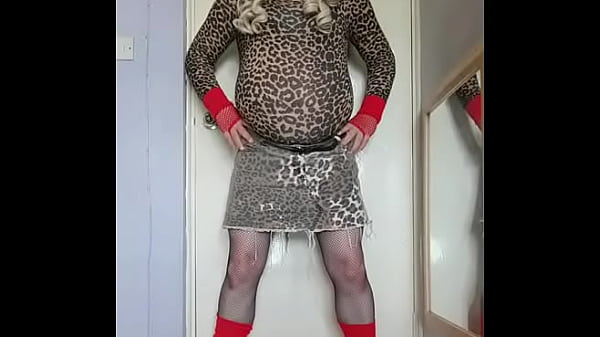 Gay crossdresser enjoying the taste of his two ...