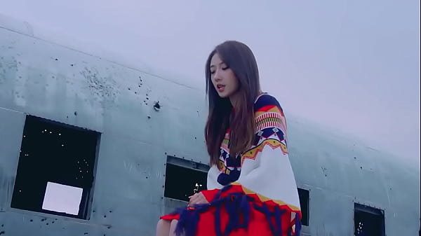 Black haired girl and dove in the snow