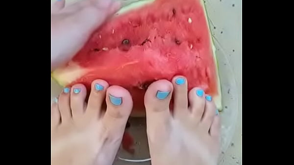 cute feet smashing watermelon