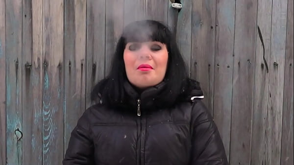 A MILF smokes and cums. Amateur fetish masturbation of a hairy pussy.