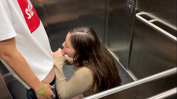 I meet my horny neighbor in the elevator and we end up fucking. WE GET CAUGHT