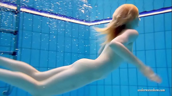 Big tits teen Lucie in the pool