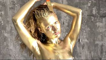 Pretty woman makes herself a golden body art, then gently fucks and sucks a dick, filled the whole body art with sperm